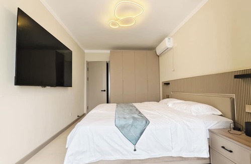 Da Dong Apartment | Beautiful penthouse apartment in Shenyang with full amenities, kitchen, WiFi, AC