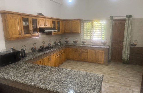 Maulvi Bazar Apartment | Salam Palace near Goala bazar holiday apartments in a village open swimming pond