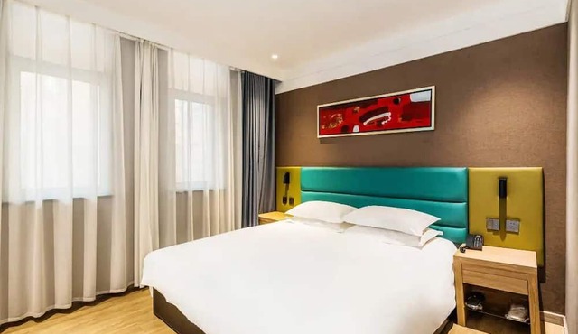 Wode Hotel Tengzhouhuochezhandian