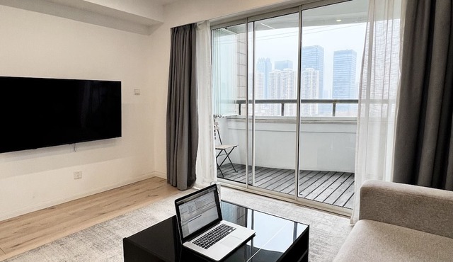 peaceful urban retreat in a stylish minimal apartment with views across the city